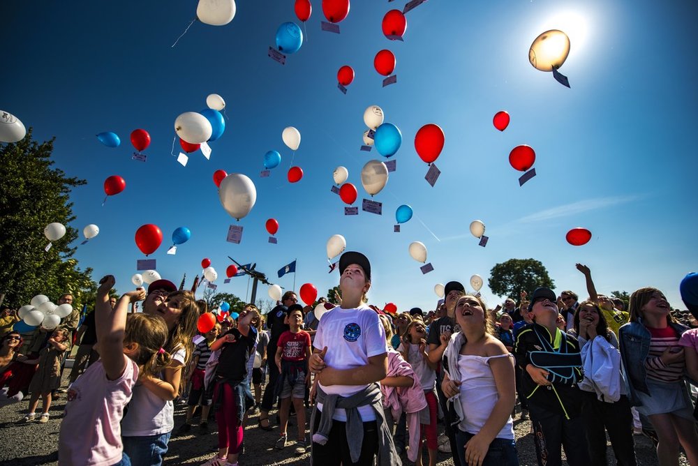 French children release balloons for a 2017 D-Day remembrance ceremony. Photo by Senior Airman Devin Boyer via the U.S. Air Force