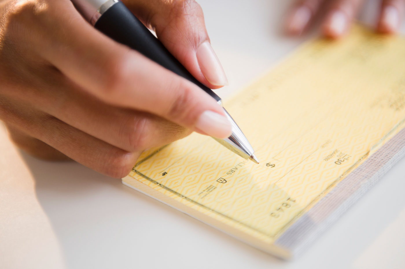 Why do so many businesses still use paper checks? - Clover Blog